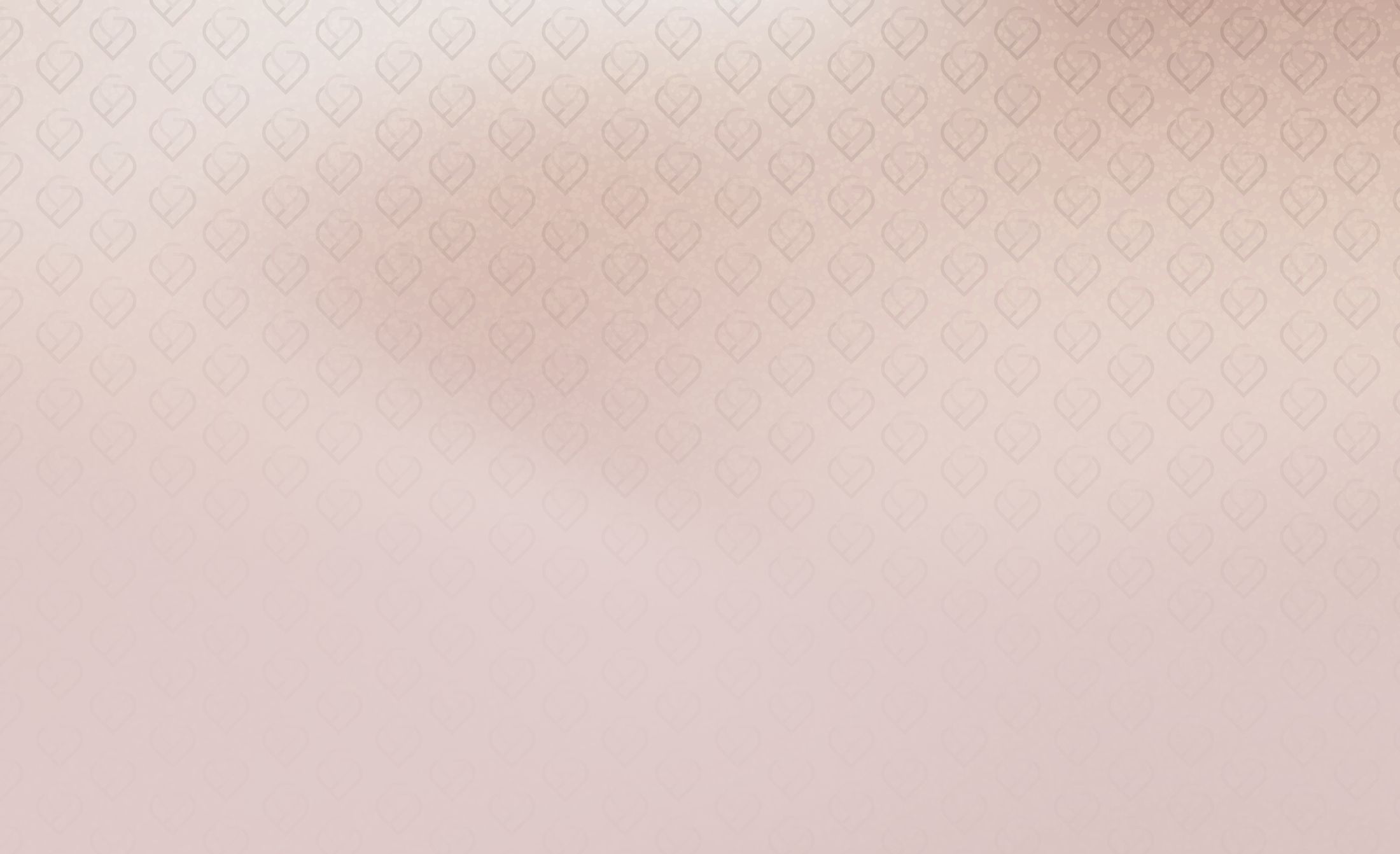 Soft pink background with heart patterns.